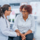 Dr and patient talking while smiling