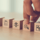 4 building blocks with icons