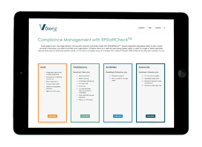 Tablet displaying a Valenz Health compliance management webpage with four package options: Basic, Professional, Enterprise, and Enhanced, each in a colored box.